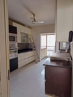 Kitchen in 6 BHK Apartment at Oberoi Sky Gardens, Andheri West – for Sale