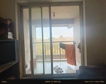 Living Room in 1 BHK Apartment at Patel RPL Bliss, Ambernath – for Sale