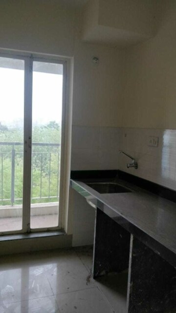 Kitchen in 1 BHK Apartment at Patel RPL Bliss, Ambernath – for Sale