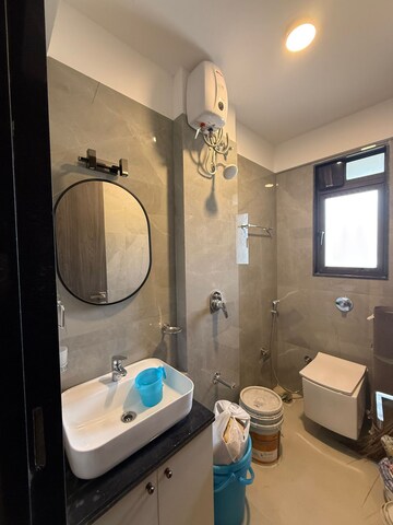 Bathroom in 2 BHK Apartment at Dev Leo Tower, Oshiwara – for Rent