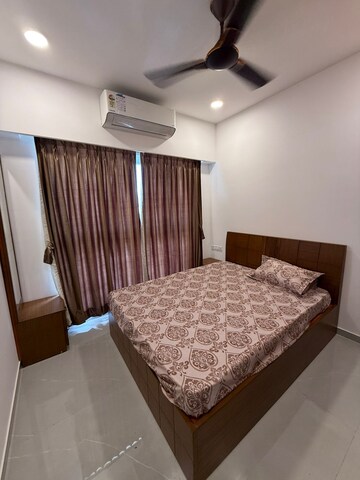 Bedroom in 2 BHK Apartment at Dev Leo Tower, Oshiwara – for Rent