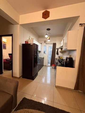 Kitchen in 2.5 BHK Apartment at Homes 121, Sector 121 – for Rent