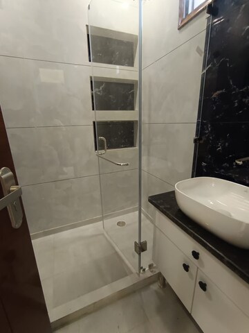 Bathroom in 3 BHK Apartment at Triveni Apartments CGHS, Paschim Vihar – for Rent