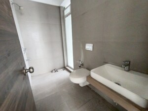 Bathroom in 3 BHK Apartment at Akshar Alvario, Seawoods – for Sale