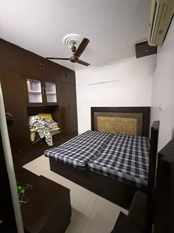 Bedroom in 2 BHK Builder Floor at Kalkaji – for Rent