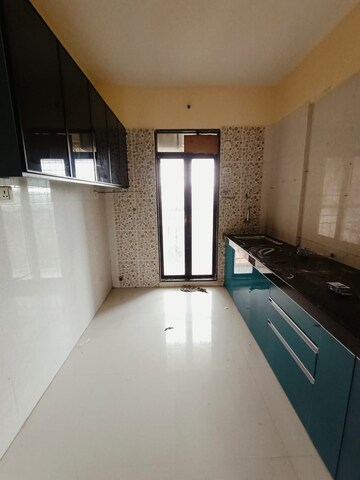Kitchen in 1 BHK Apartment at Alpha Saffron Hill, Badlapur East – for Sale
