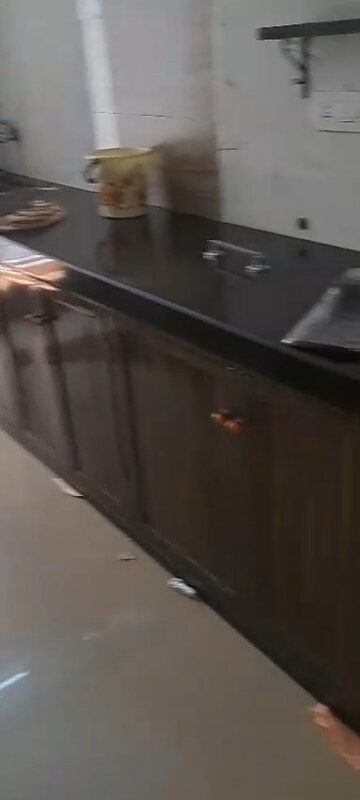Kitchen in 2 BHK Apartment at Chanchal Kalyan Complex, Yari Road – for Rent