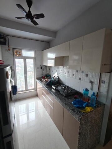 Kitchen in 1 BHK Apartment at Om Saath Grandness, Dahisar East – for Sale