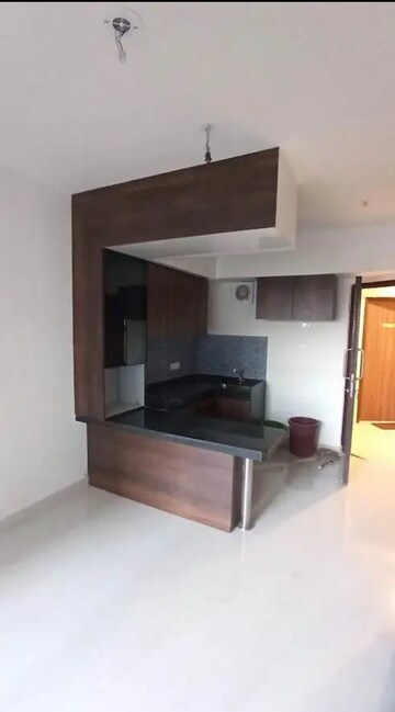 Living Room in 1 BHK Apartment at Lodha Crown Quality Homes, Majiwada – for Rent