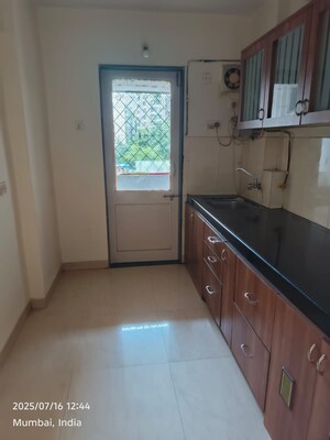 Kitchen in 2 BHK Apartment at Suchidham Complex, Goregaon East – for Sale