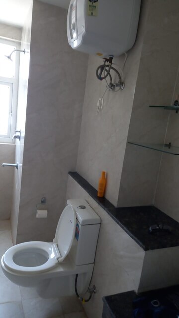 Bathroom in 3 BHK Apartment at Adani Oyster Grande Phase 2, Sector 102 – for Rent