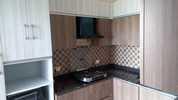 Kitchen in 3 BHK Apartment at Adani Oyster Grande Phase 2, Sector 102 – for Rent