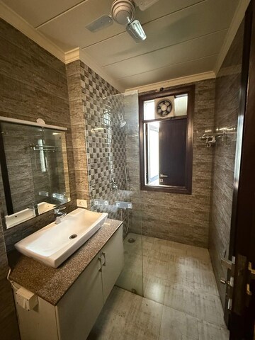 Bathroom in 3 BHK Builder Floor at Nehru Enclave – for Rent