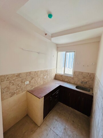 Living Room in 2 BHK Apartment at Amrapali Golf Homes, Haibatpur – for Sale