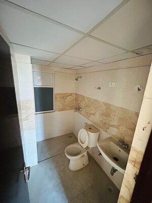 Bathroom in 2 BHK Apartment at Amrapali Golf Homes, Haibatpur – for Sale