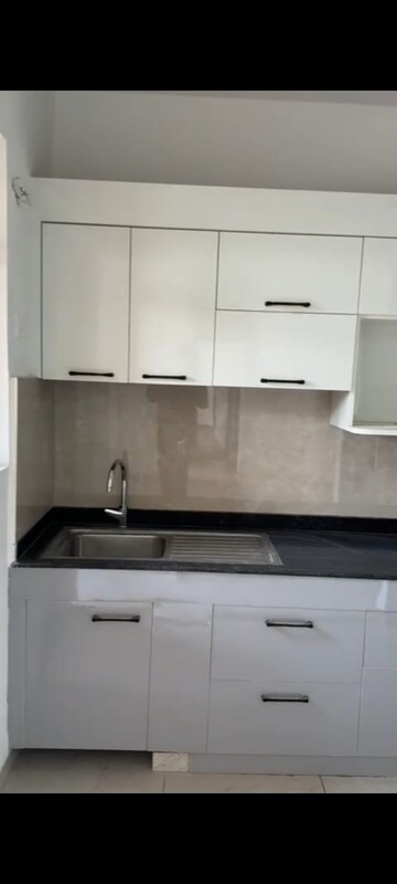 Kitchen in 3 BHK Apartment at Rishita Manhattan, Gomti Nagar – for Rent