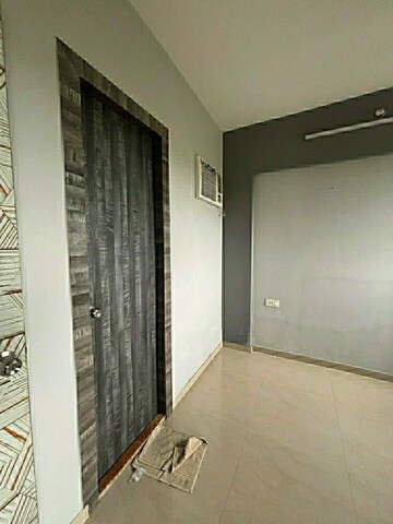 Building Lobby in 2.5 BHK Apartment at Lodha Casa Rio, Dombivli East – for Rent