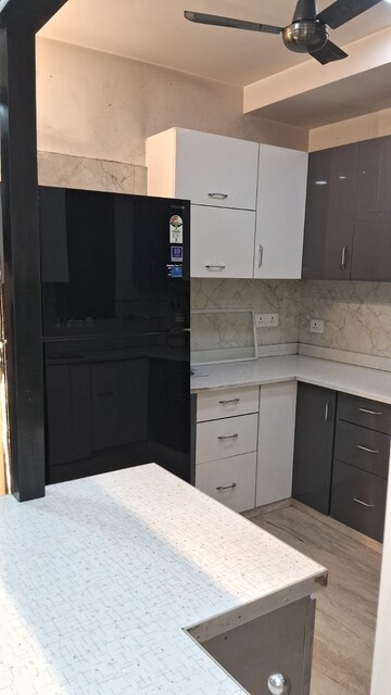 Kitchen in 2 BHK Builder Floor at Rajouri Garden – for Rent