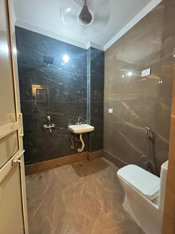 Bathroom in 1 BHK Apartment at Palm Residency Chhatarpur, Chattarpur – for Rent