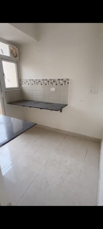 Kitchen in 2 BHK Apartment at Signature Global Orchard Avenue, Sector 93 – for Sale