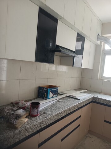 Kitchen in 4 BHK Apartment at 3C Lotus Panache, Sector 110 – for Rent
