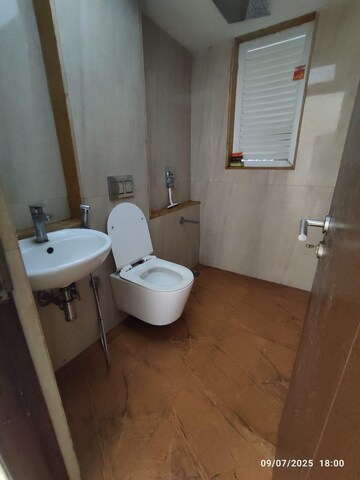 Bathroom in 2 BHK Apartment at Ruparel Ariana, Parel – for Rent