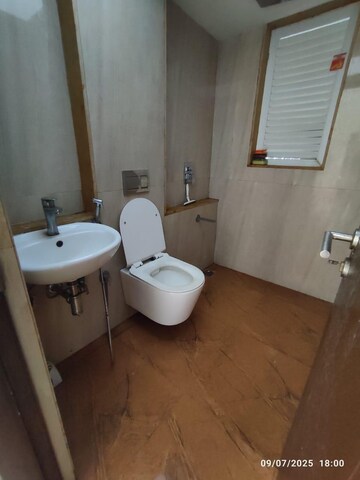 Bathroom in 2 BHK Apartment at Ruparel Ariana, Parel – for Rent