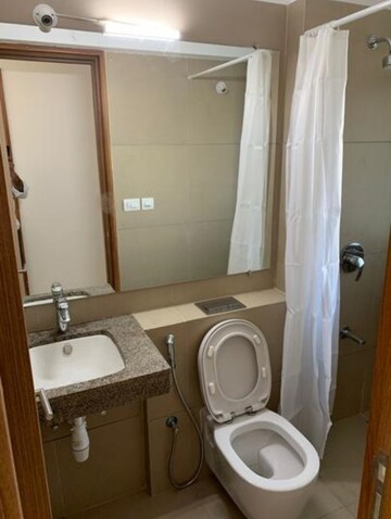 Bathroom in 2 BHK Apartment at Kalpataru Sunrise Grande, Kolshet Road – for Rent
