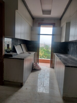 Kitchen in 3 BHK Builder Floor at Knowledge Park V Greater Noida – for Sale