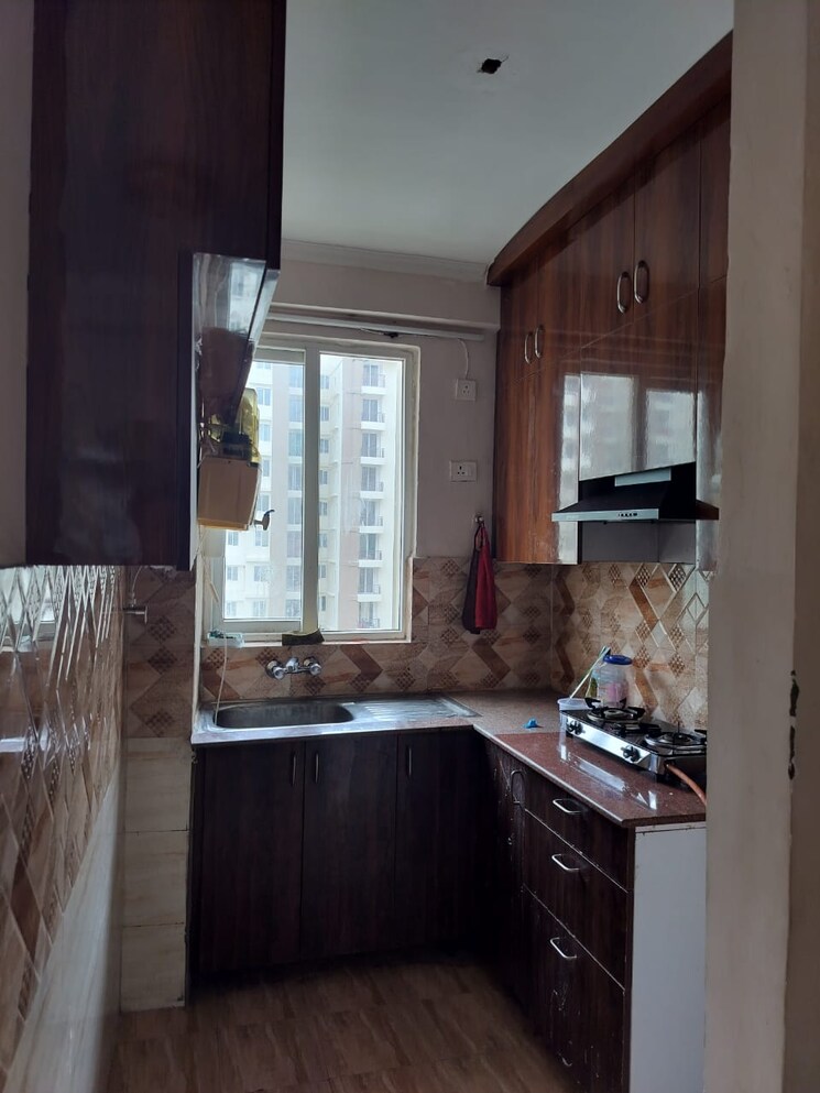 Kitchen, amrapali-golf-homes 2.5 Bedroom 945 Sq.Ft. Apartment In Sector 4 Greater Noida Greater Noida 9064238