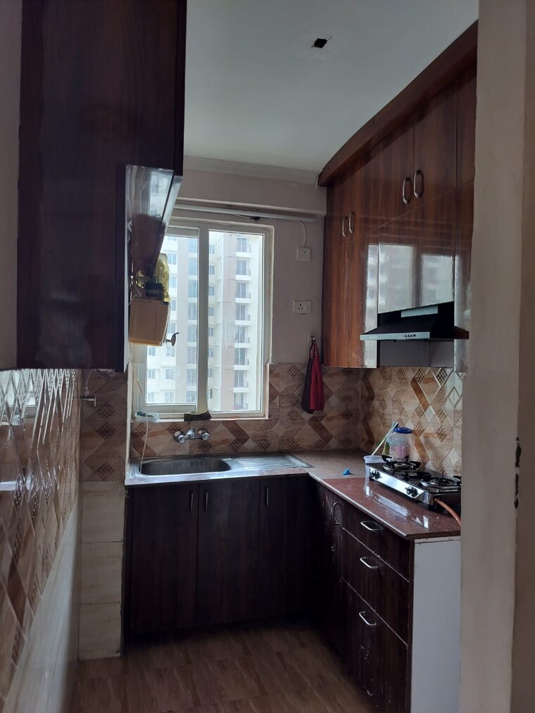 Kitchen, amrapali-golf-homes 2.5 Bedroom 945 Sq.Ft. Apartment In Sector 4 Greater Noida Greater Noida 9064238