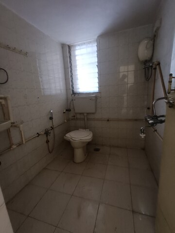 Bathroom in 2 BHK Apartment at Eden Rose 3, Mira Road – for Rent