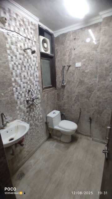 Bathroom in 2 BHK Builder Floor at Chattarpur – for Rent