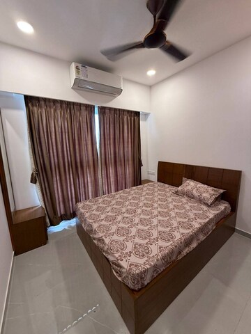 Bedroom in 2 BHK Apartment at Dev Leo Tower, Oshiwara – for Rent