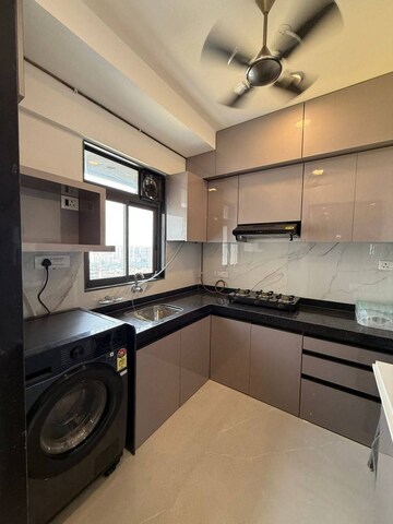 Kitchen in 2 BHK Apartment at Dev Leo Tower, Oshiwara – for Rent