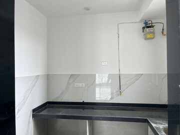 Kitchen in 2 BHK Apartment at Dev Leo Tower, Oshiwara – for Sale