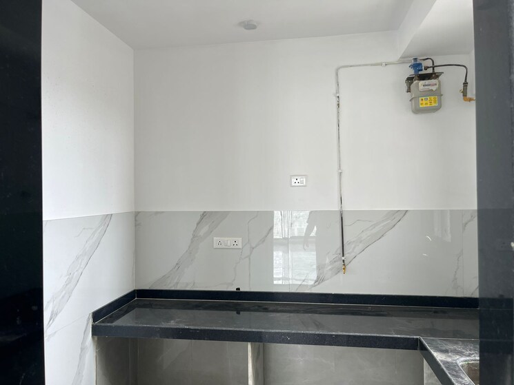 Kitchen, dev-leo-tower 2 Bedroom 900 Sq.Ft. Apartment In Oshiwara Mumbai 9064372