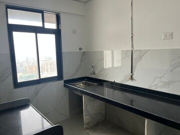 Kitchen in 2 BHK Apartment at Dev Leo Tower, Oshiwara – for Sale