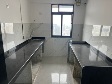 Kitchen in 2 BHK Apartment at Dev Leo Tower, Oshiwara – for Sale
