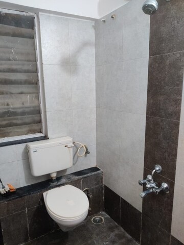 Bathroom in 2 BHK Apartment at Kedar Nagar – for Sale