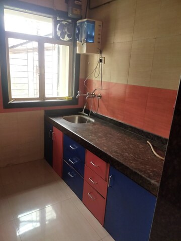 Kitchen in 1 BHK Apartment at Raunak Heights, Ghodbunder Road – for Rent
