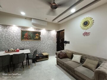 Living Room in 1 BHK Apartment at Lodha Amara, Kolshet Road – for Sale