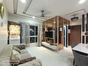 Living Room in 1 BHK Apartment at Lodha Amara, Kolshet Road – for Sale
