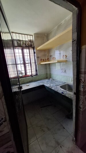 Kitchen in 1.5 BHK Apartment at Sector 10 Greater Noida – for Sale