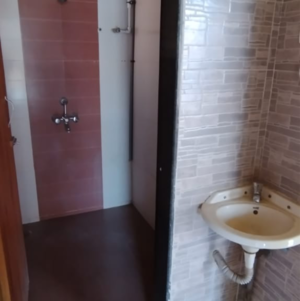 Bathroom in 2 BHK Apartment at Yug Shree Shankar Heights, Kamothe Sector 36 – for Sale