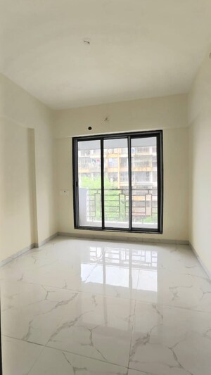 Room in 1 BHK Apartment at Sai Raj Flora, Ambivali – for Sale