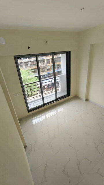 Room in 2 BHK Apartment at Sai Raj Flora, Ambivali – for Sale