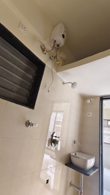 Bathroom in 2 BHK Apartment at Sai Raj Flora, Ambivali – for Sale