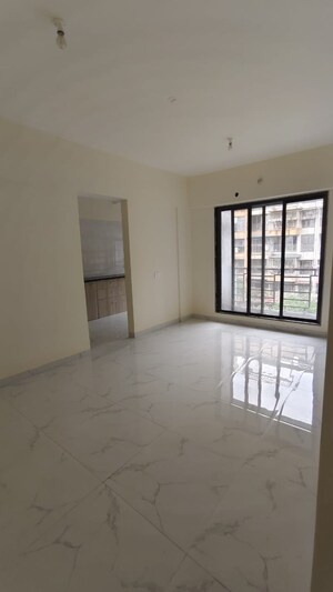 Room in 2 BHK Apartment at Sai Raj Flora, Ambivali – for Sale