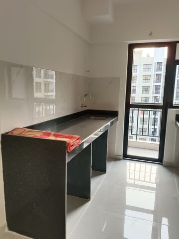 Kitchen in 2 BHK Apartment at Runwal Gardens, Dombivli East – for Sale